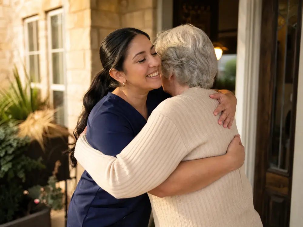 Familiar caregiver greeting a client at home